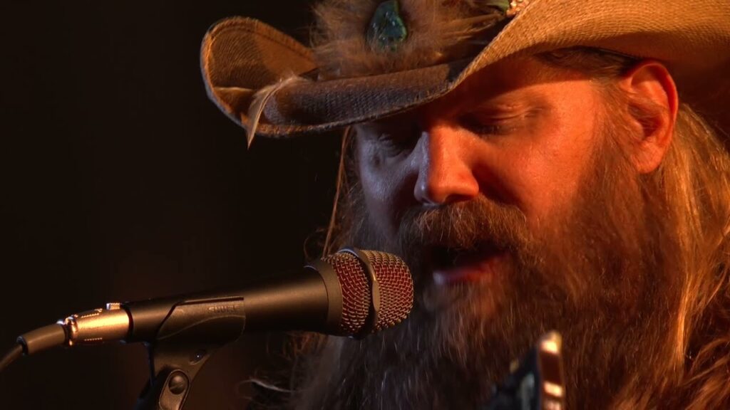 Chris Stapleton performing 'Cold' live at the CMA Awards 2021, expressing deep emotion during the performance.